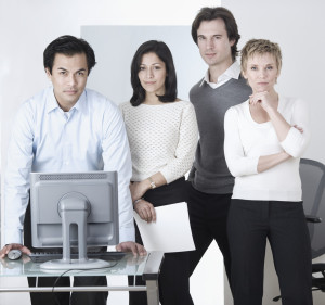 Business Team at Computer